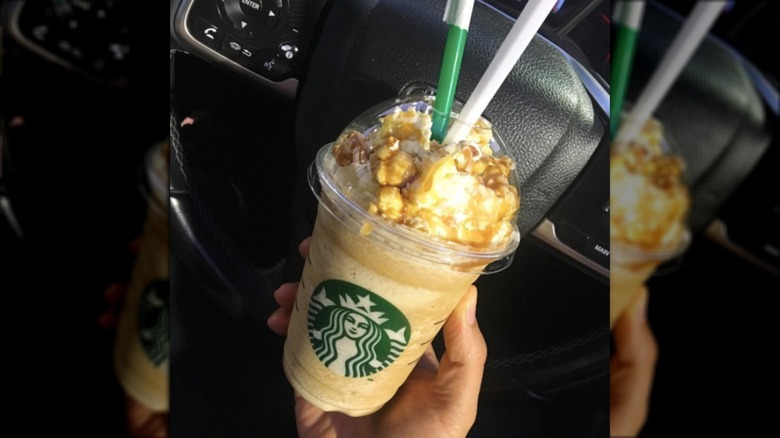 side view of Starucks caramel popcorn pretzel frappuccino