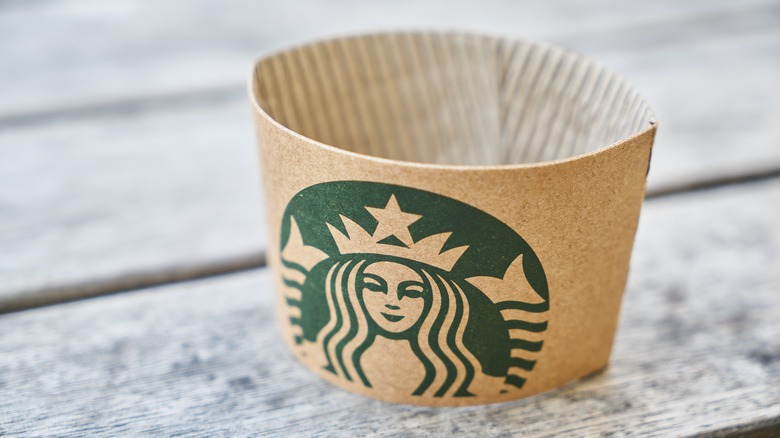 starbucks paper cup wrapper with logo