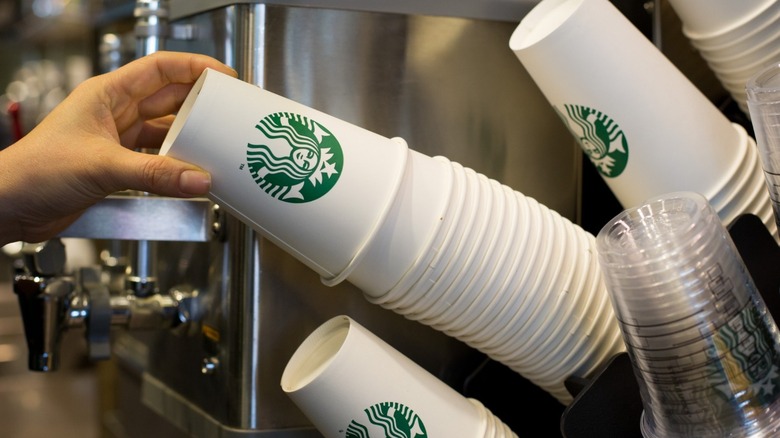 stack of Starbucks coffee cups