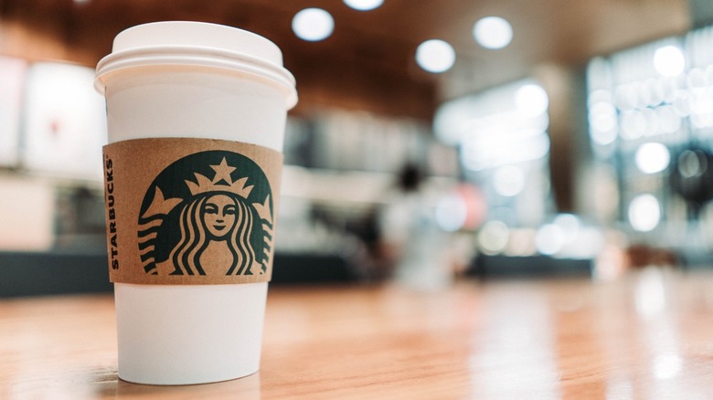 Starbucks cup on a counter