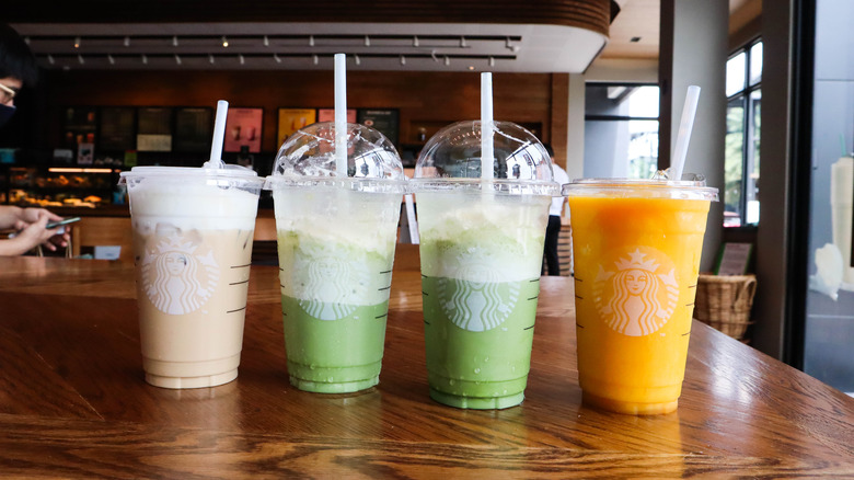 Cold Starbucks drinks on table