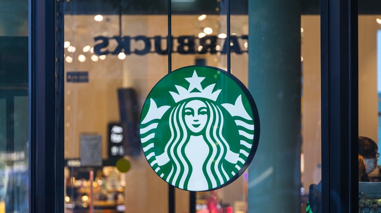 Starbucks logo in a window