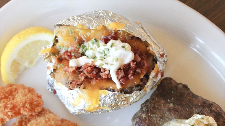 Loaded baked potato in foil