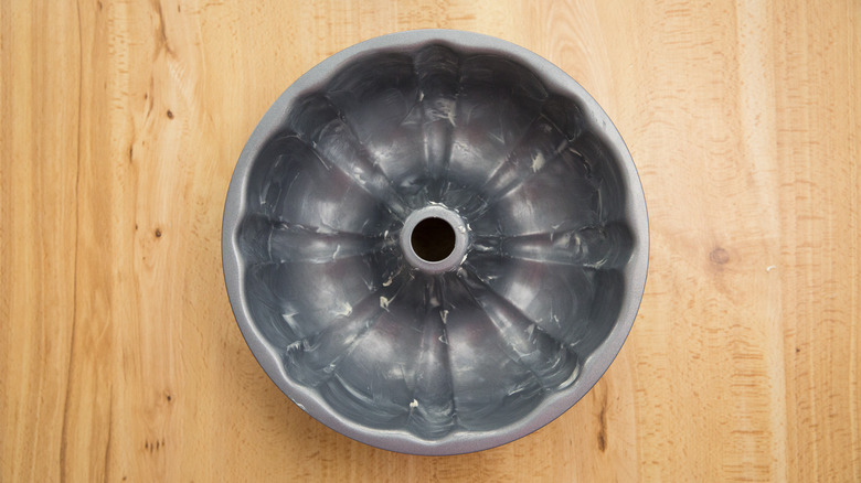 greased bundt pan on table