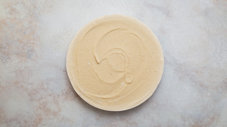 vegan cheesecake on marble counter