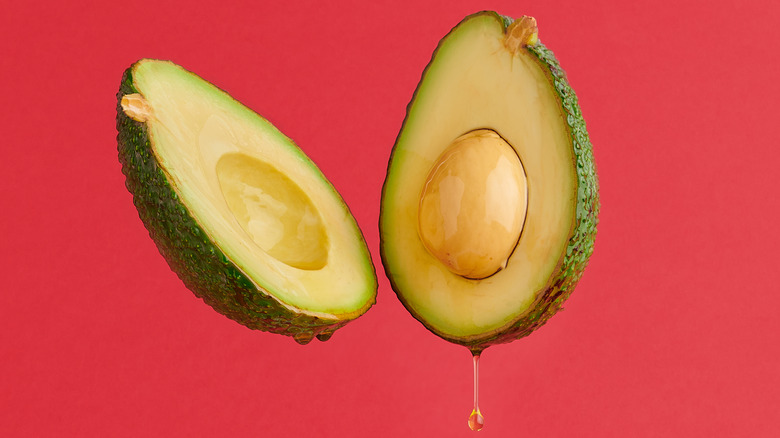 Avocado dripping green oil