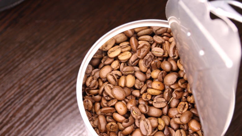 open can of coffee beans