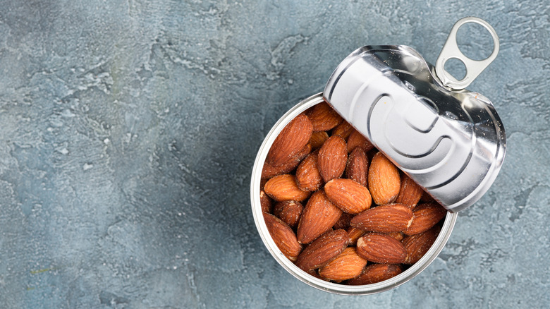 open can of almonds