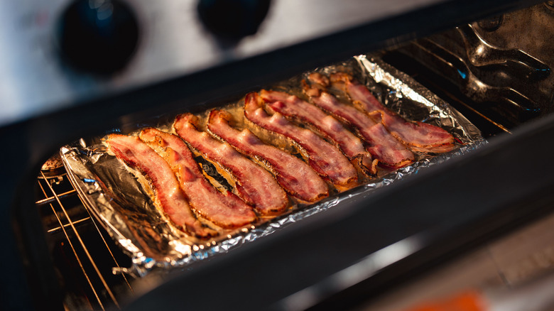 Bacon on a foil-lined oven pan.