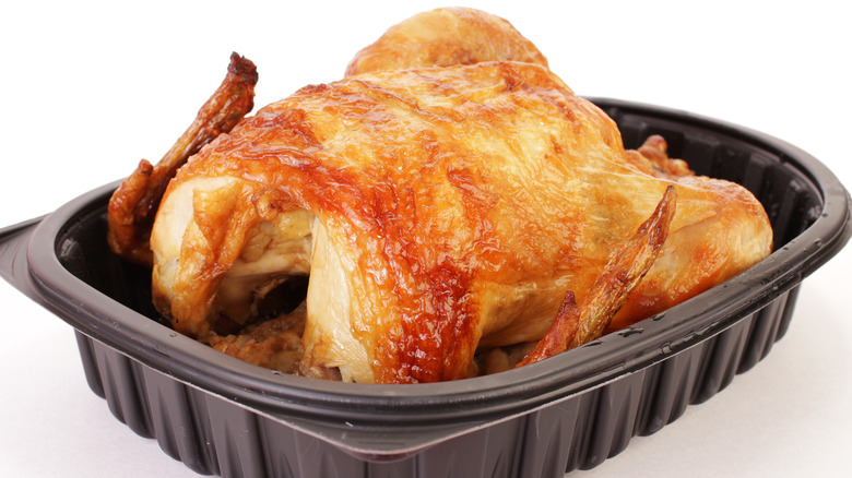 rotisserie chicken in plastic tray