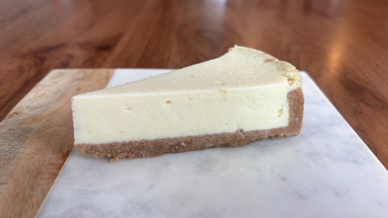 slice of plain cheesecake on plate