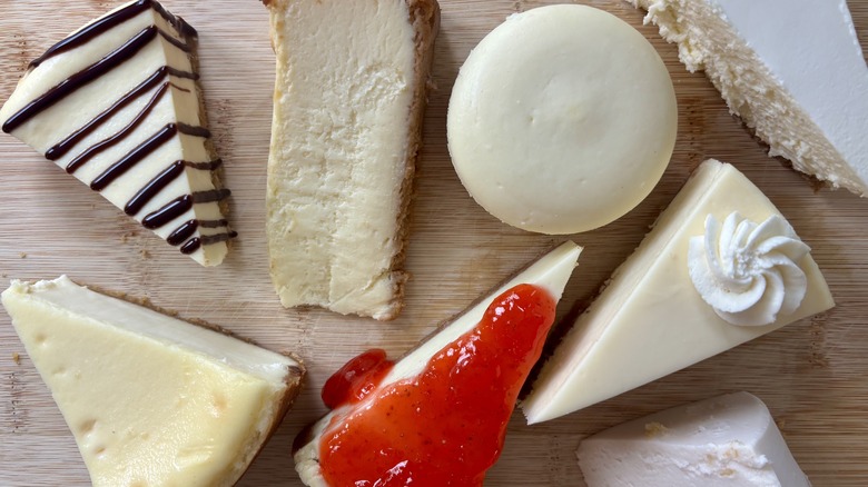 slices of cheesecake on a wooden board