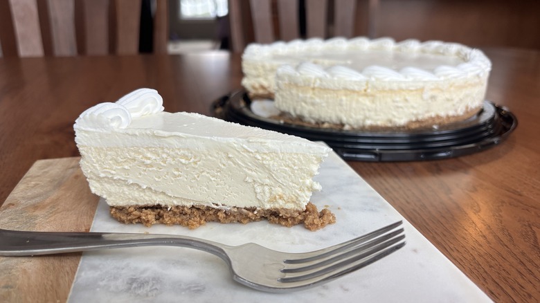 slice of cheesecake with sour cream topping