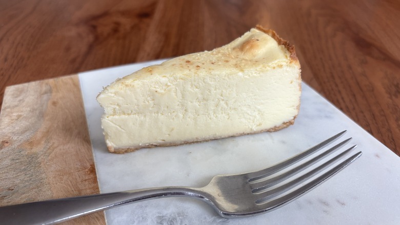slice of cheesecake with fork