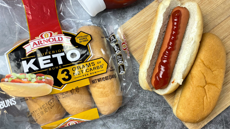 A package of Arnold Keto Buns next to a hot dog with ketchup