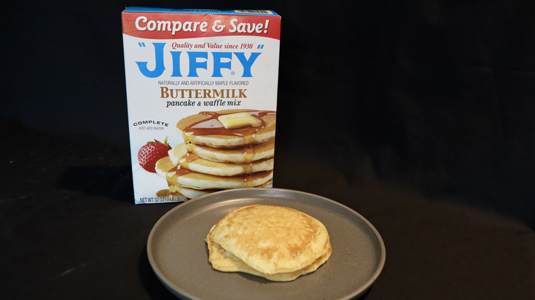 pancake on plate in front of JIFFY box