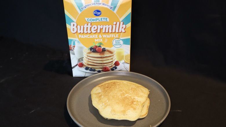 pancake on plate in front of Kroger box