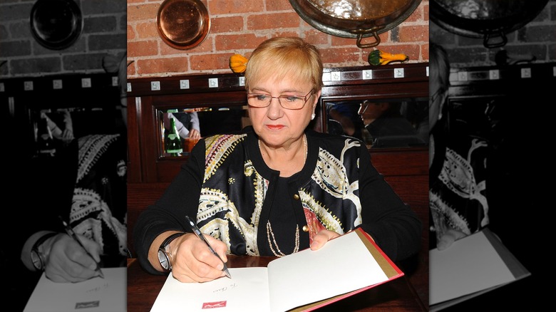 Lidia Bastianich signing a copy of her book