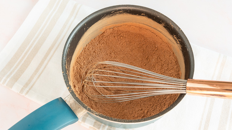 mixing cocoa powder and sugar