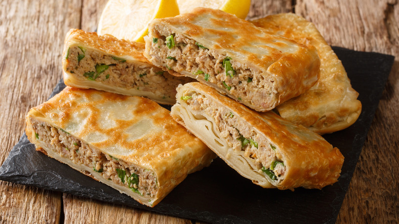 Stack of meat-filled martabak