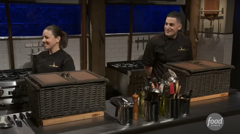 "Chopped" contestants with mystery baskets in front of them