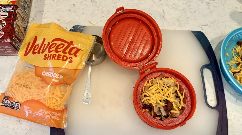 StufZ stuffed burger maker filled with ground beef and bacon, onions, and cheese filling