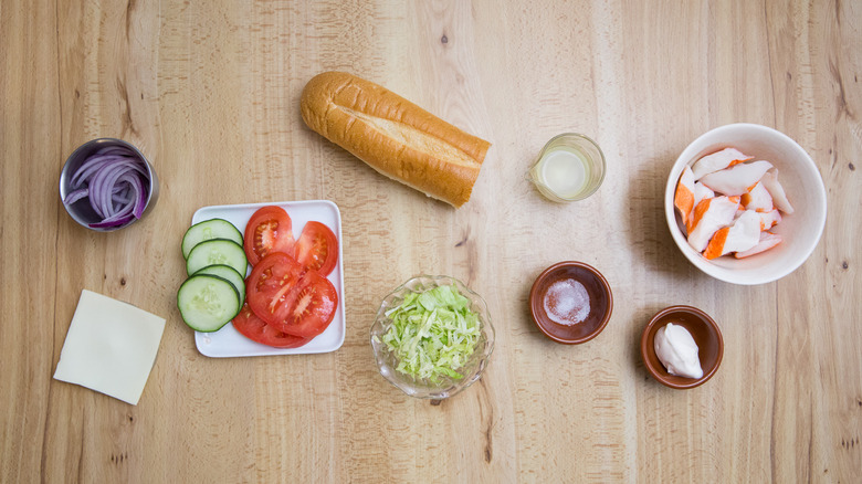 Subway seafood sensation sandwich ingredients on table