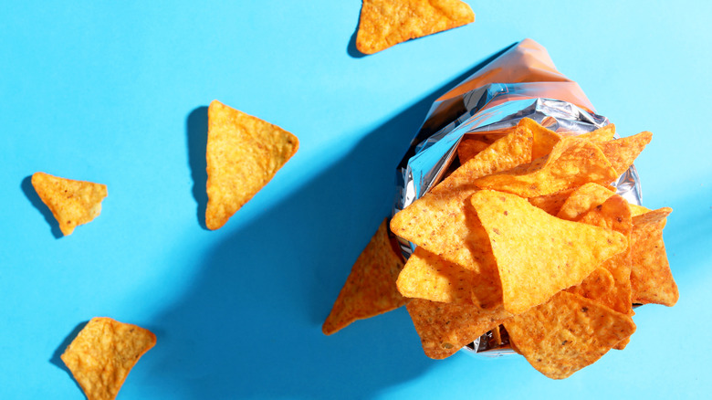 bag of doritos against blue background