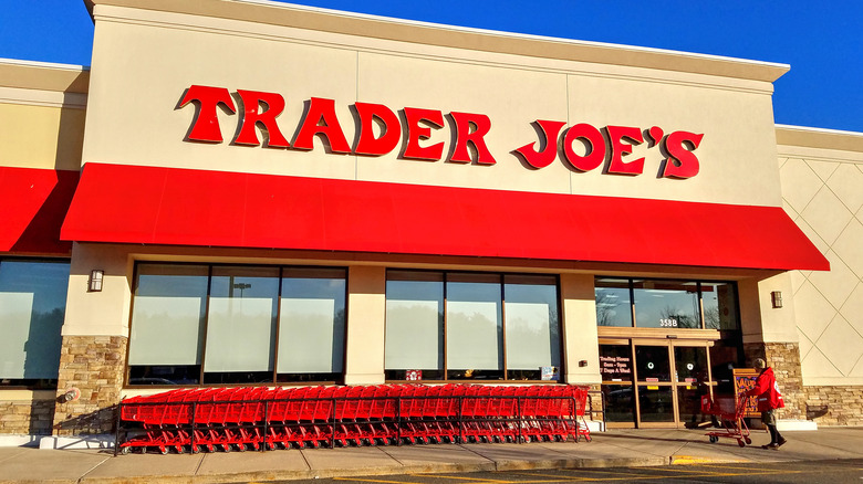 Trader Joe's storefront with row of red carts