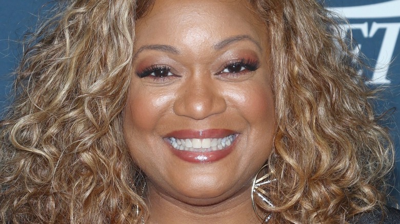 Sunny Anderson smiling at event