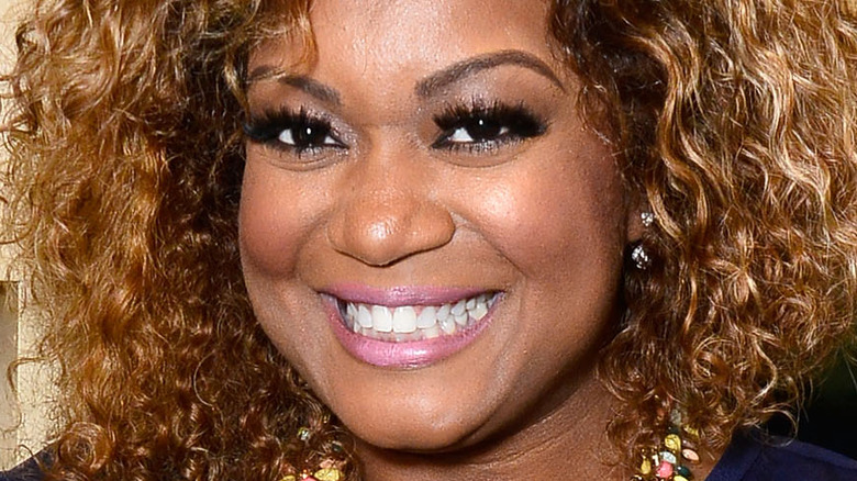 Sunny Anderson with bright smile