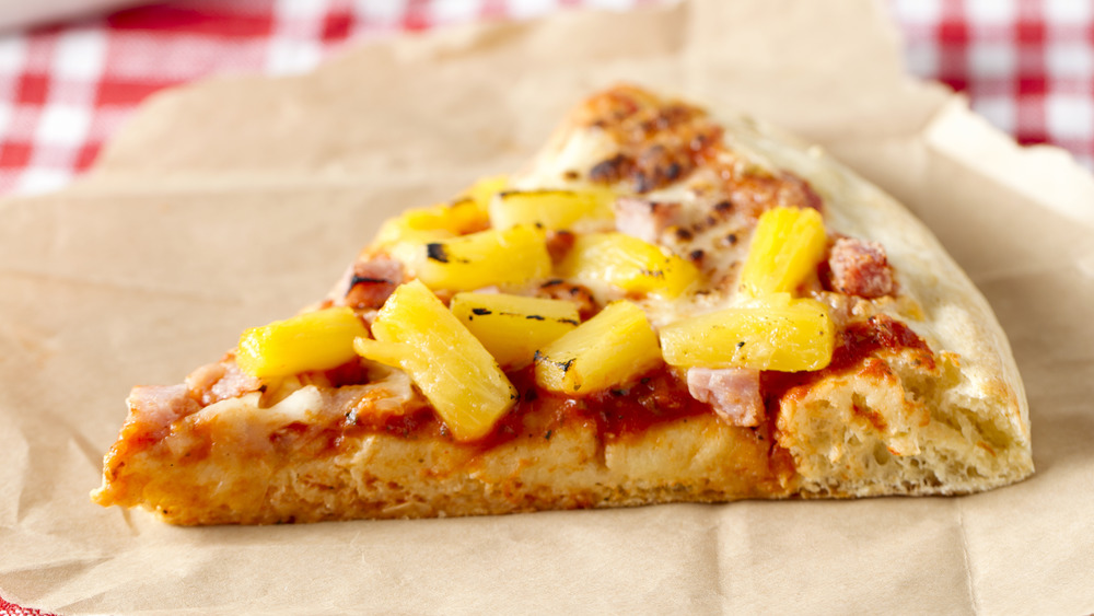 Pineapple pizza slice