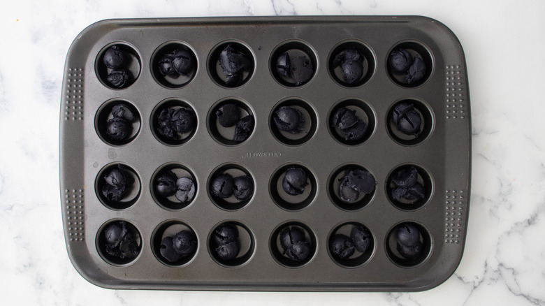black cookie dough in pan