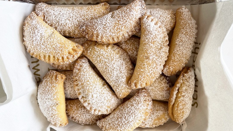 empanadas covered in powdered sugar