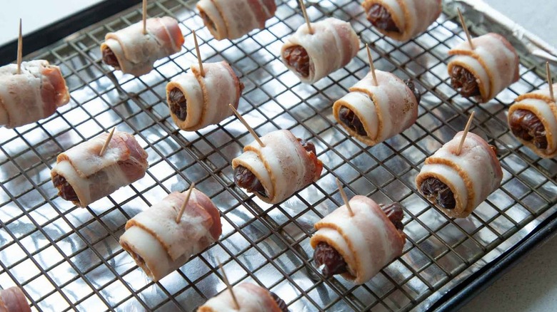 dates wrapped in raw bacon