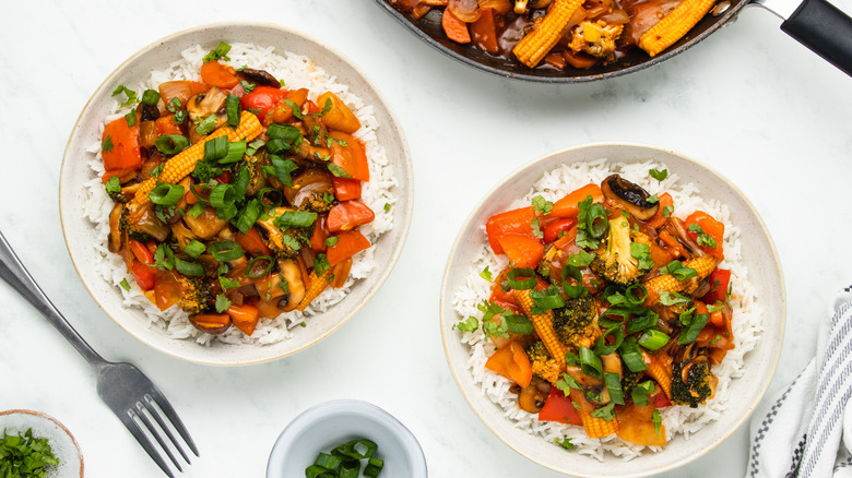 sweet and sour vegetable stir-fry over rice