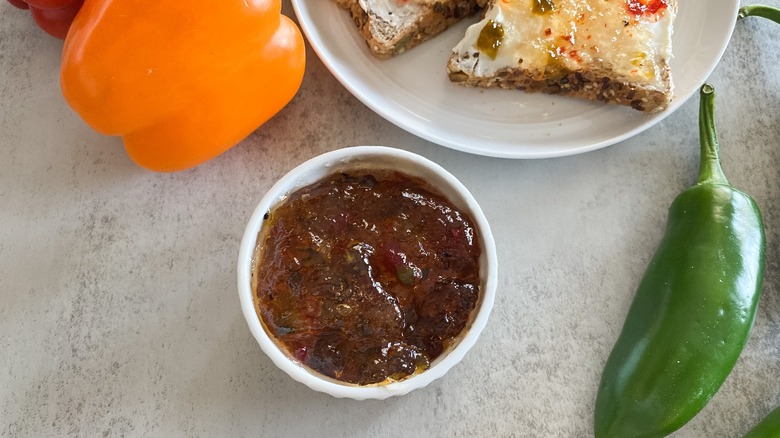 sweet and spicy pepper jelly in small bowl