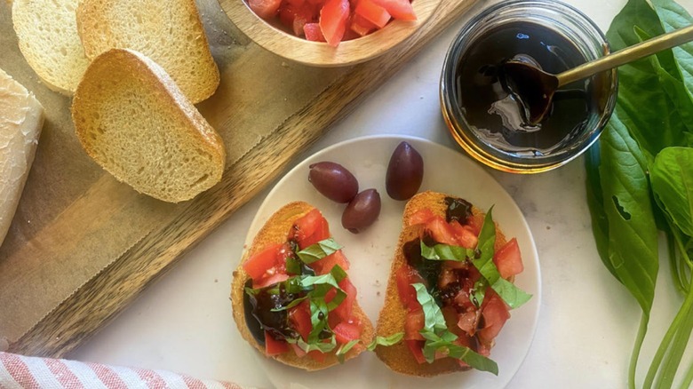 balsamic glaze on tomato bruschetta