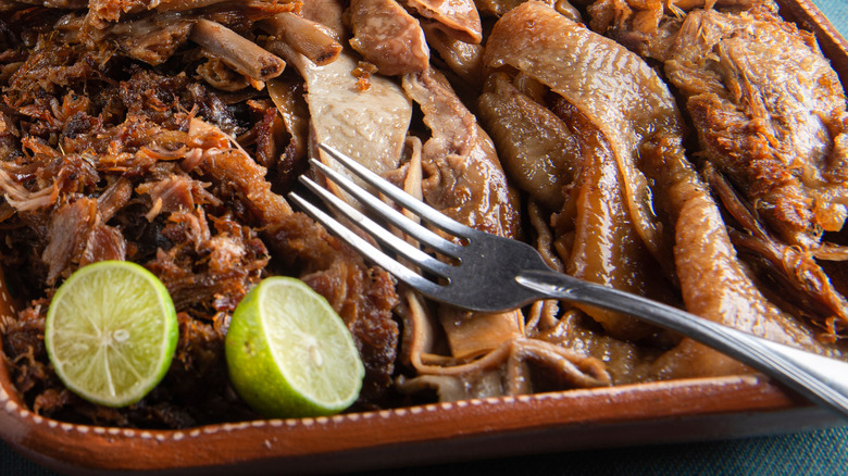 carnitas plate with limes