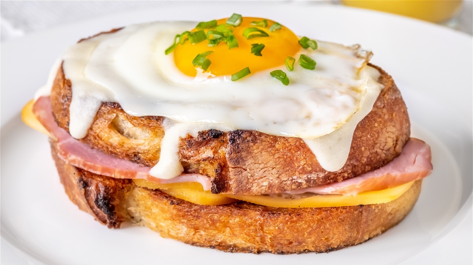 Switching Up Your Croque Madame Means Using A Once-Stale Baked Good