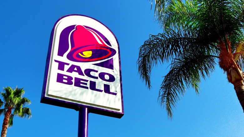 Taco Bell sign and palm trees