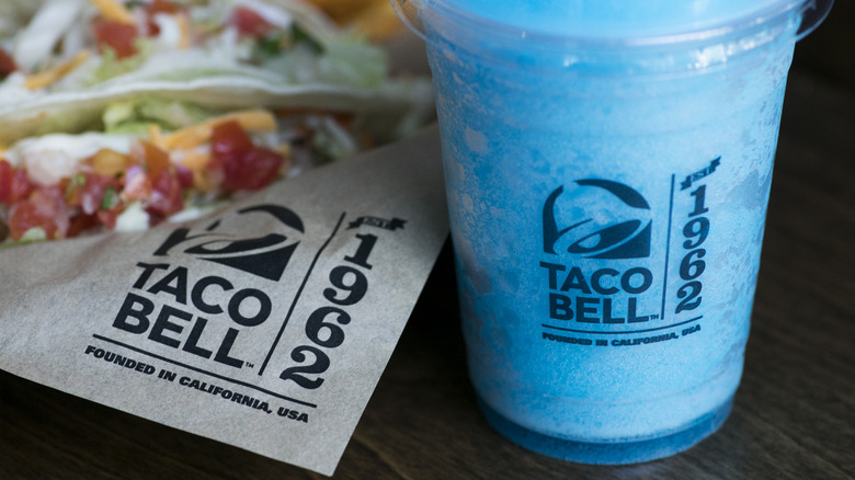 Taco Bell Blue Freeze with food
