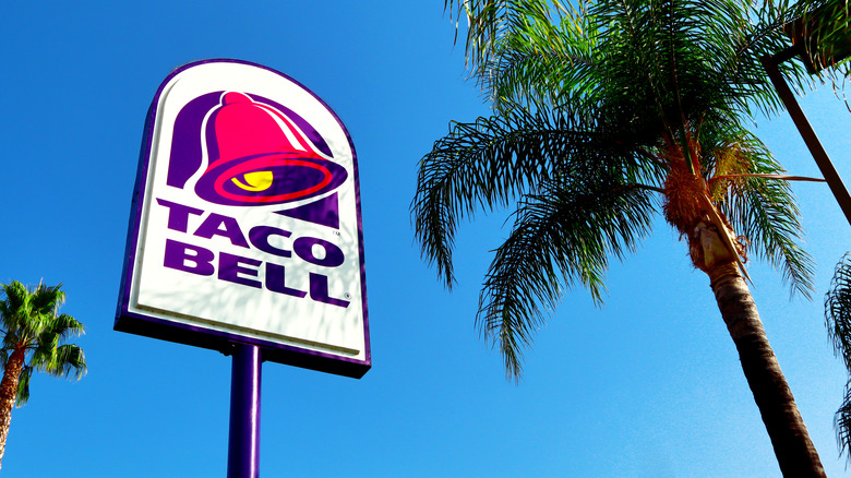 Taco Bell sign with trees