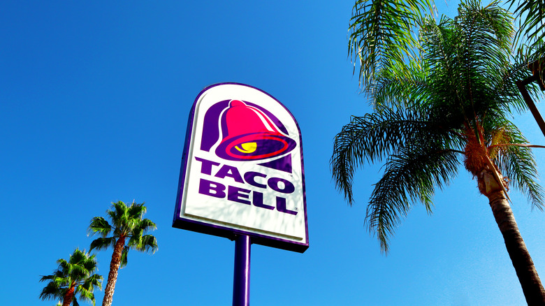 Taco Bell sign against a blue sky