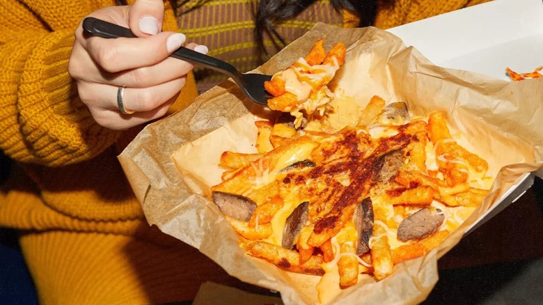 Forkful of Grilled Cheese Nacho Fries 