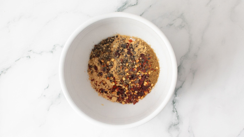 Seasoning blend unmixed in bowl