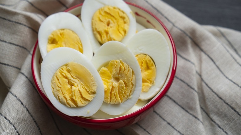 Bowl of halved hard-boiled eggs
