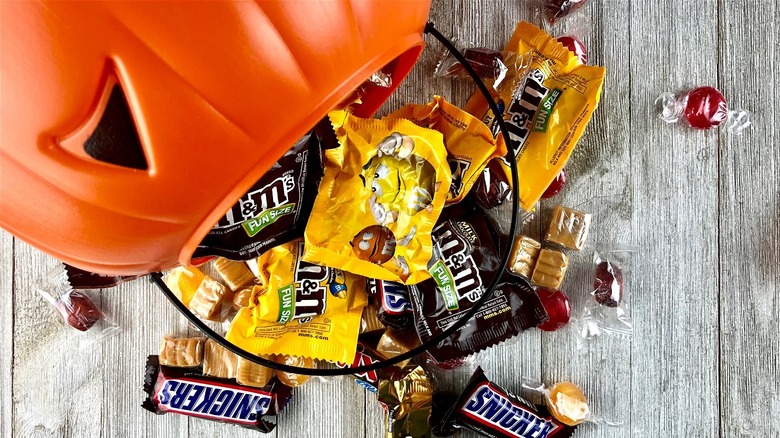 Halloween bucket spilling candy