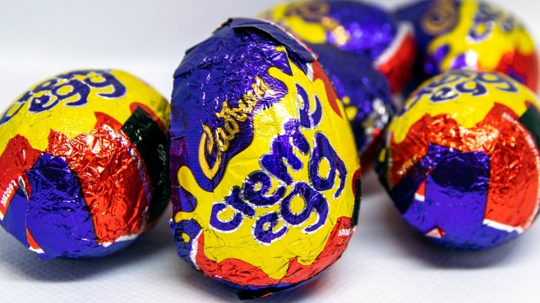 Cadbury chocolate eggs on a white background