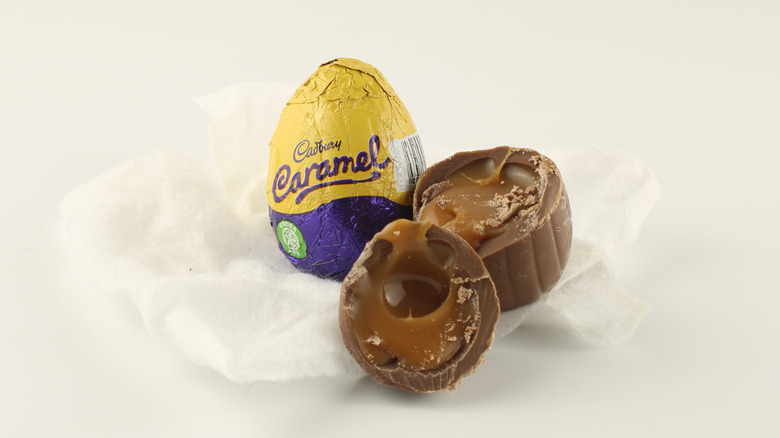 Cadbury caramel eggs on a white background